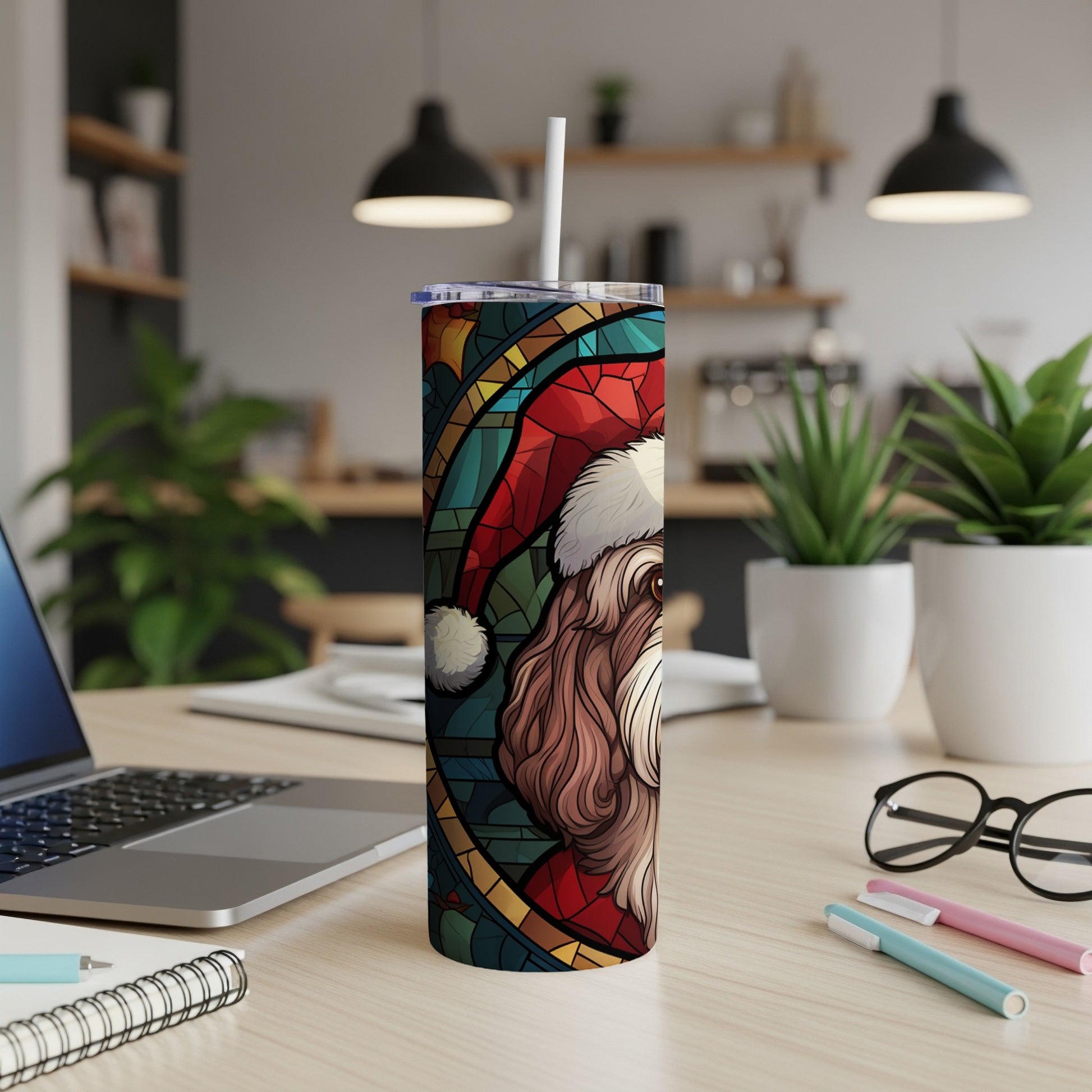 Dog in Santa hat on a stained glass tumbler.