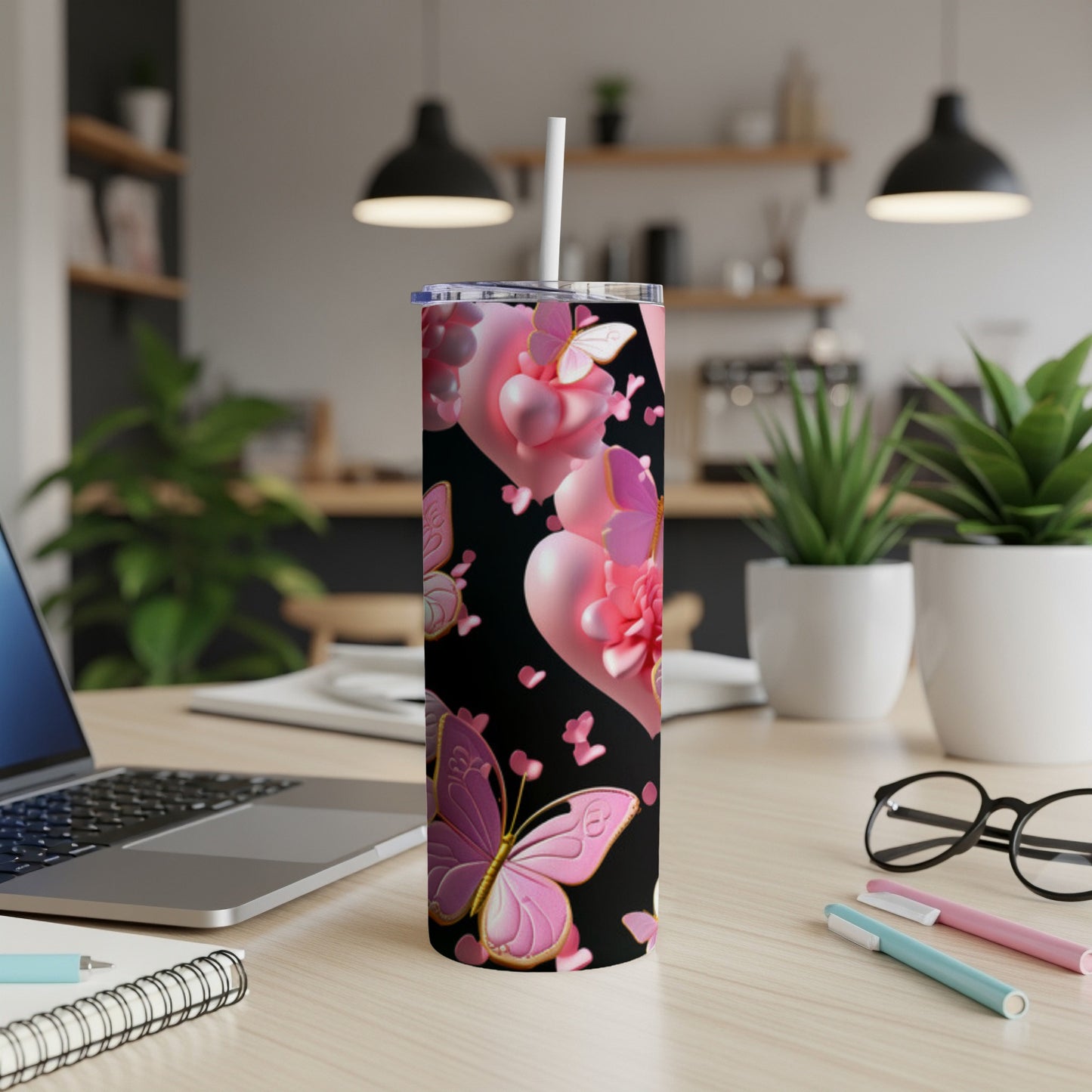 Black tumbler with pink butterflies and hearts design.