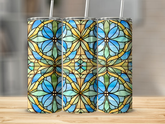 Three stained glass tumblers with floral patterns in blue and green.