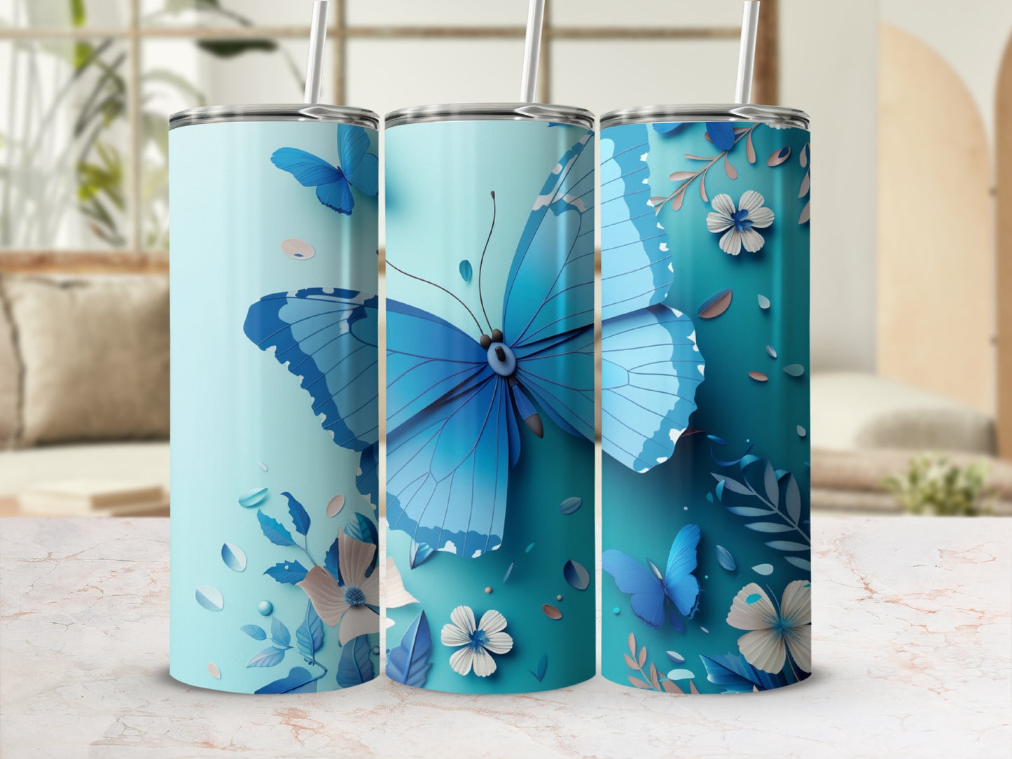 Blue butterfly with floral accents on a light blue tumbler.
