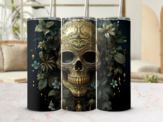 Gold ornate skull surrounded by dark foliage and light blue flowers.