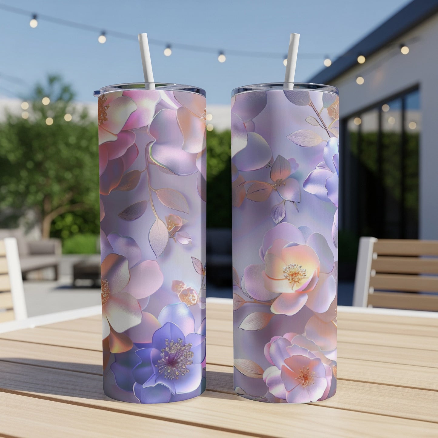 Two tall, slender tumblers with a floral pattern featuring purple and pink flowers.
