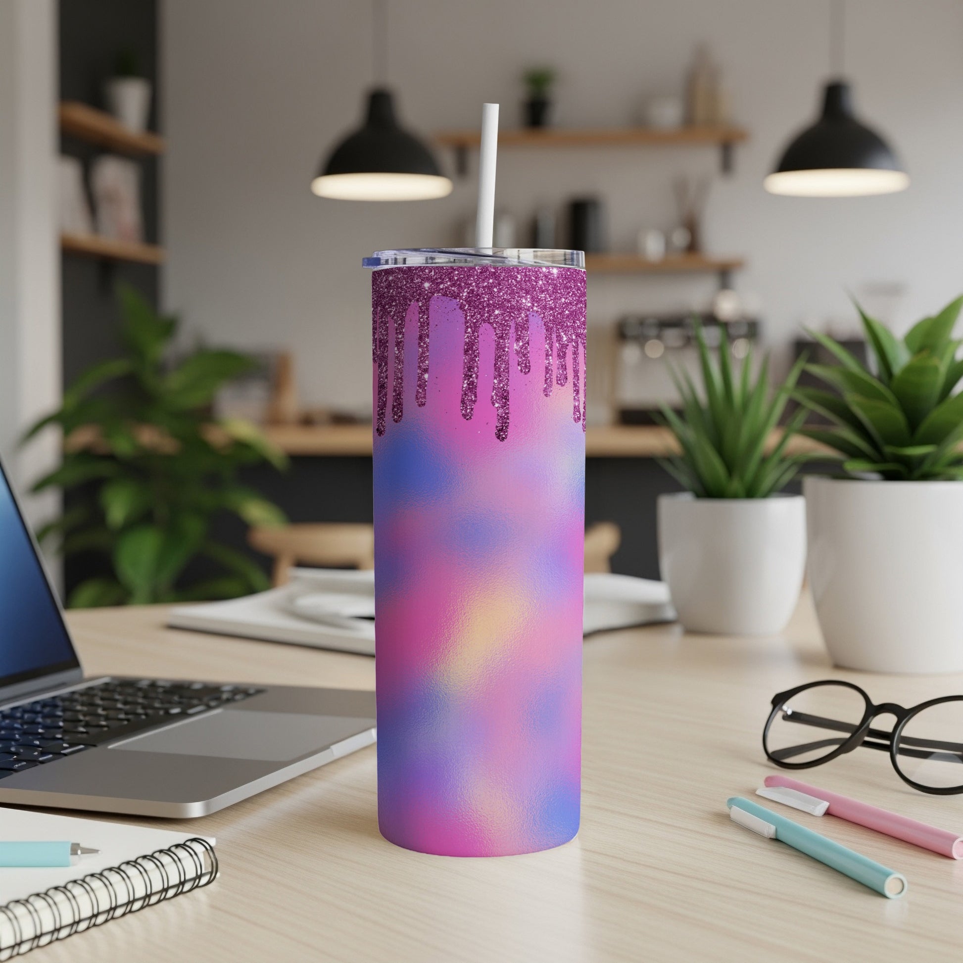 Glitter drip tumbler with a pink, blue, and purple tie-dye pattern.