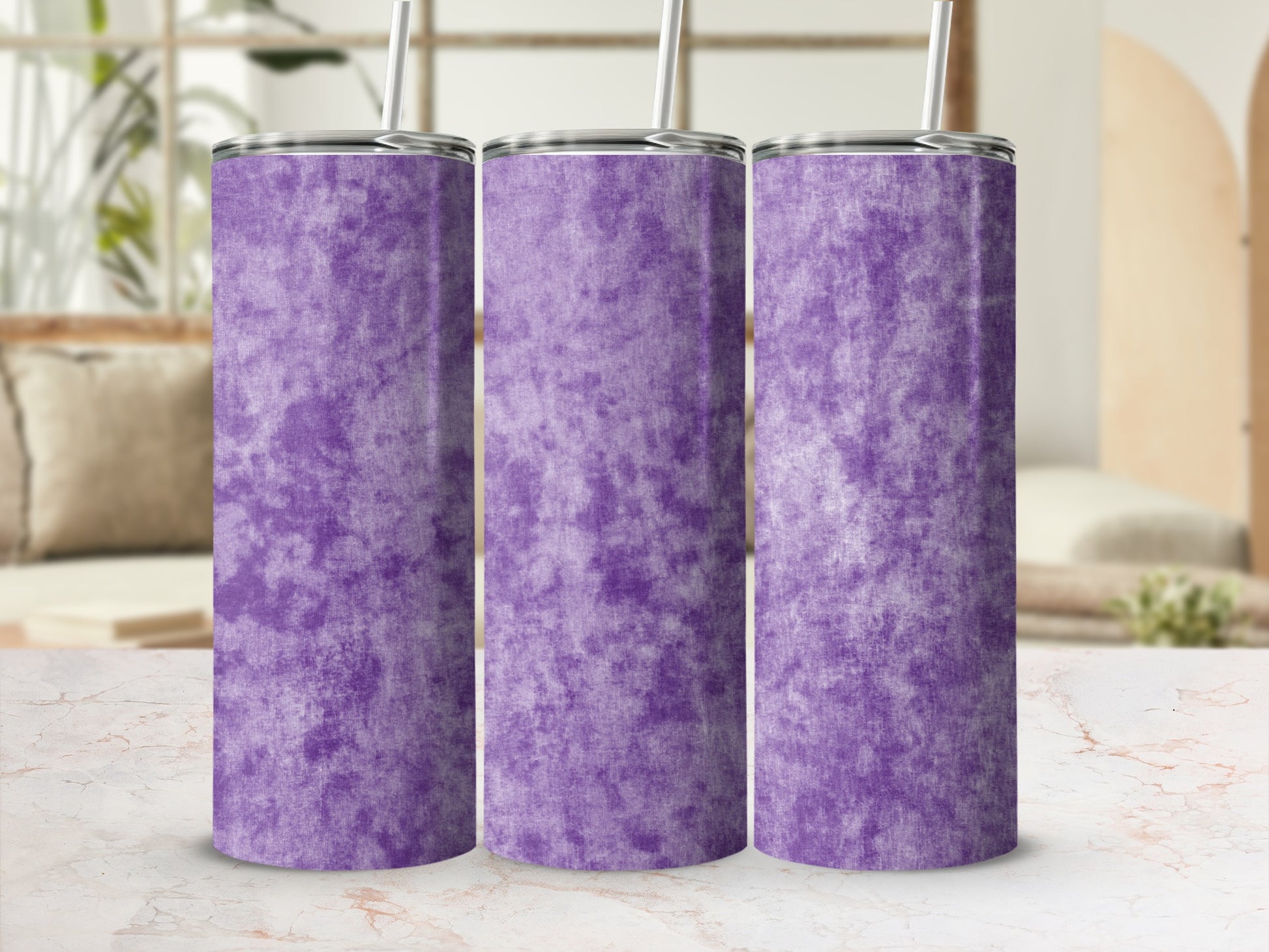 Three purple tumblers with a textured marble-like pattern and metal straws.