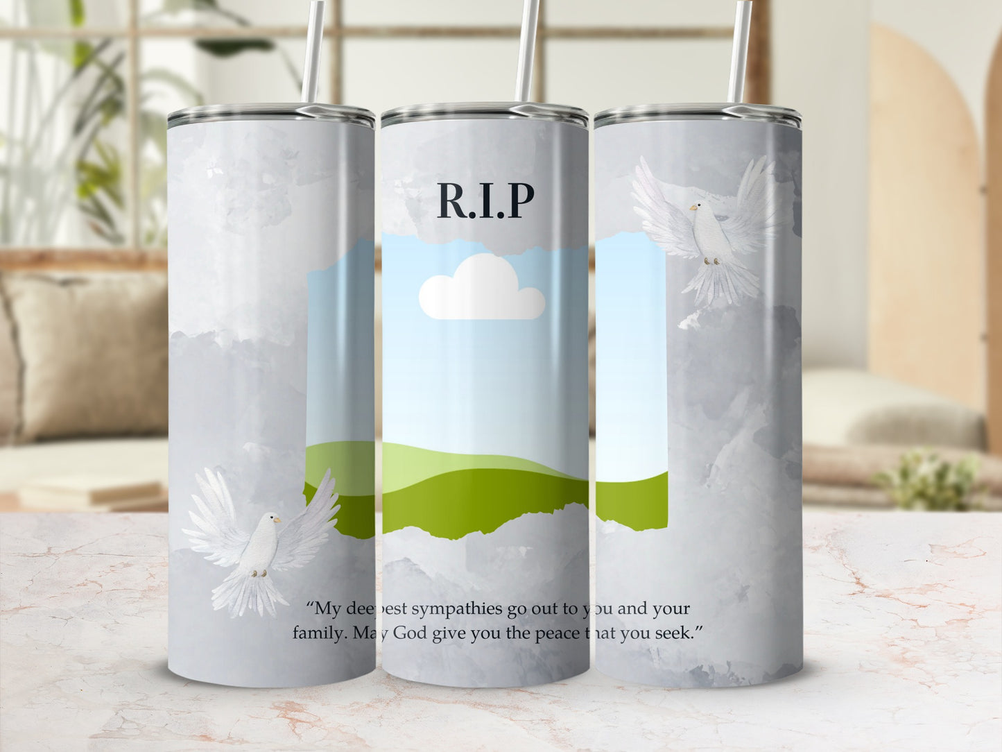 Tribute tumbler with R.I.P text, doves, landscape, and condolence message.
