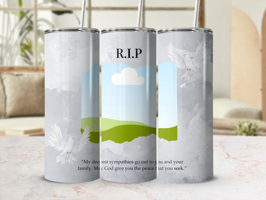 Tribute tumbler with R.I.P text, doves, landscape, and condolence message.