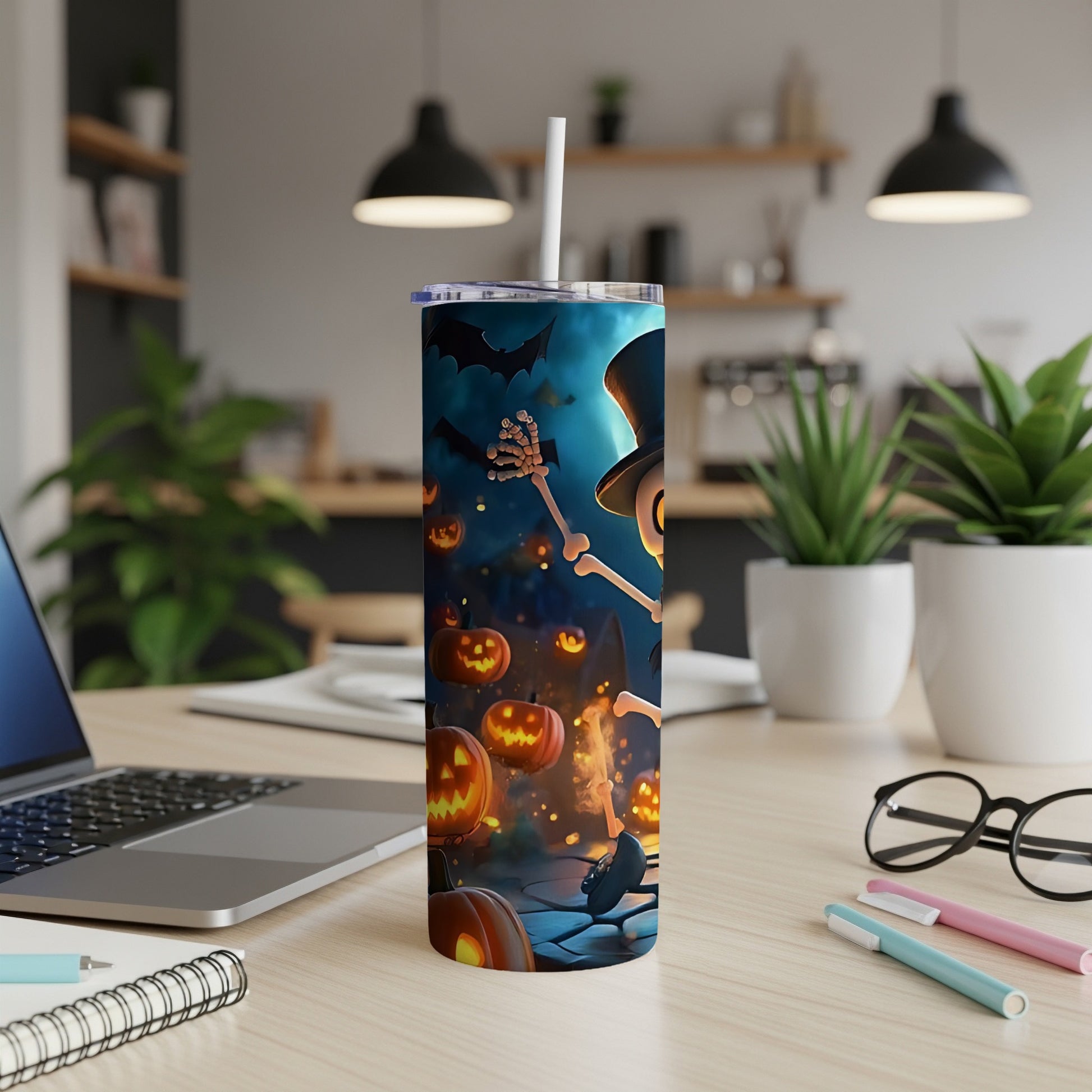 Skeleton in top hat on Halloween tumbler with pumpkins and bats.
