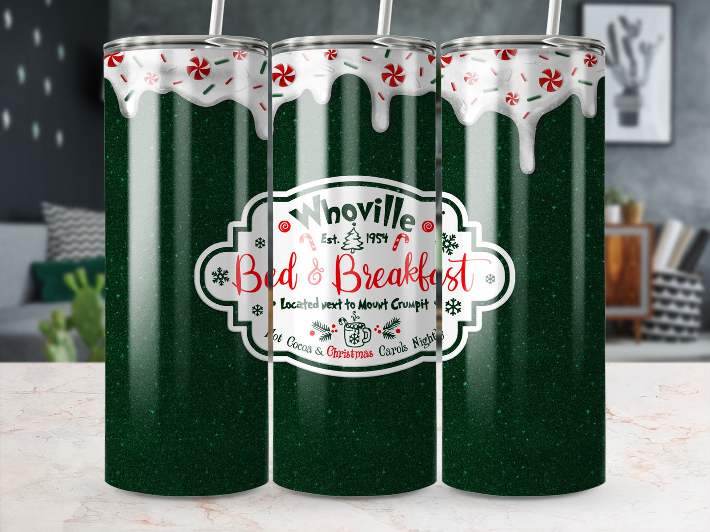 Green glitter tumbler with "Whoville Bed & Breakfast" text and holiday candy details.