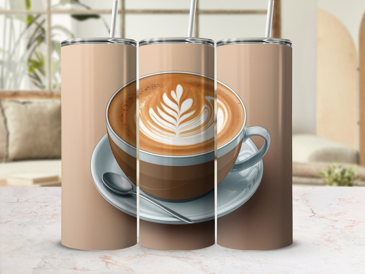 Three tall coffee tumblers with latte art on a light marble surface.