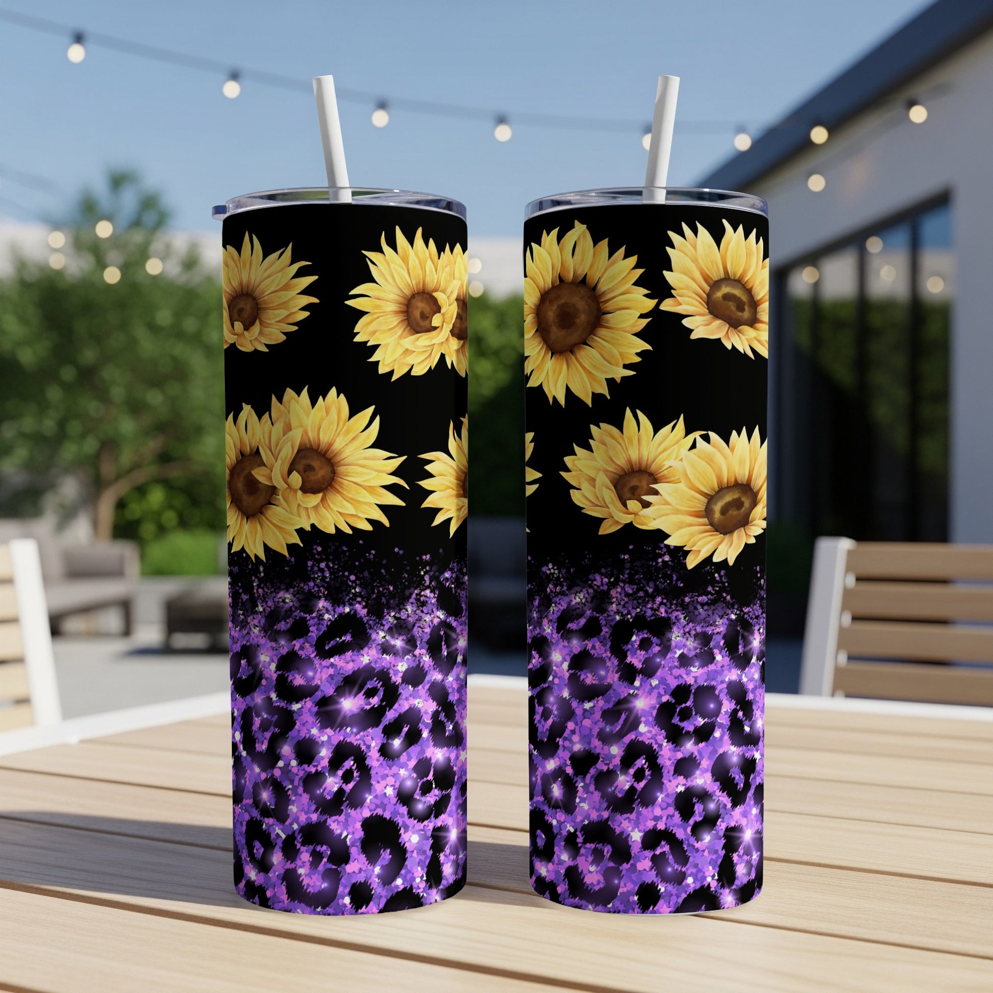 Two tumblers with sunflowers and purple leopard print against a black background.