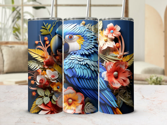 Blue parrot surrounded by vibrant flowers and leaves on a dark blue tumbler.