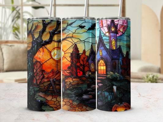 Three Halloween-themed tumblers with stained glass art of spooky castles and trees.