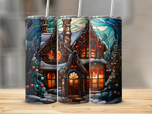 Stained glass style tumbler with cozy, snow-covered house and Christmas trees.