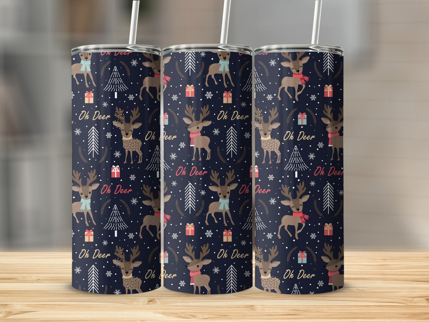 Three tumblers with "Oh Deer" and deer, snowflakes, and Christmas tree pattern.