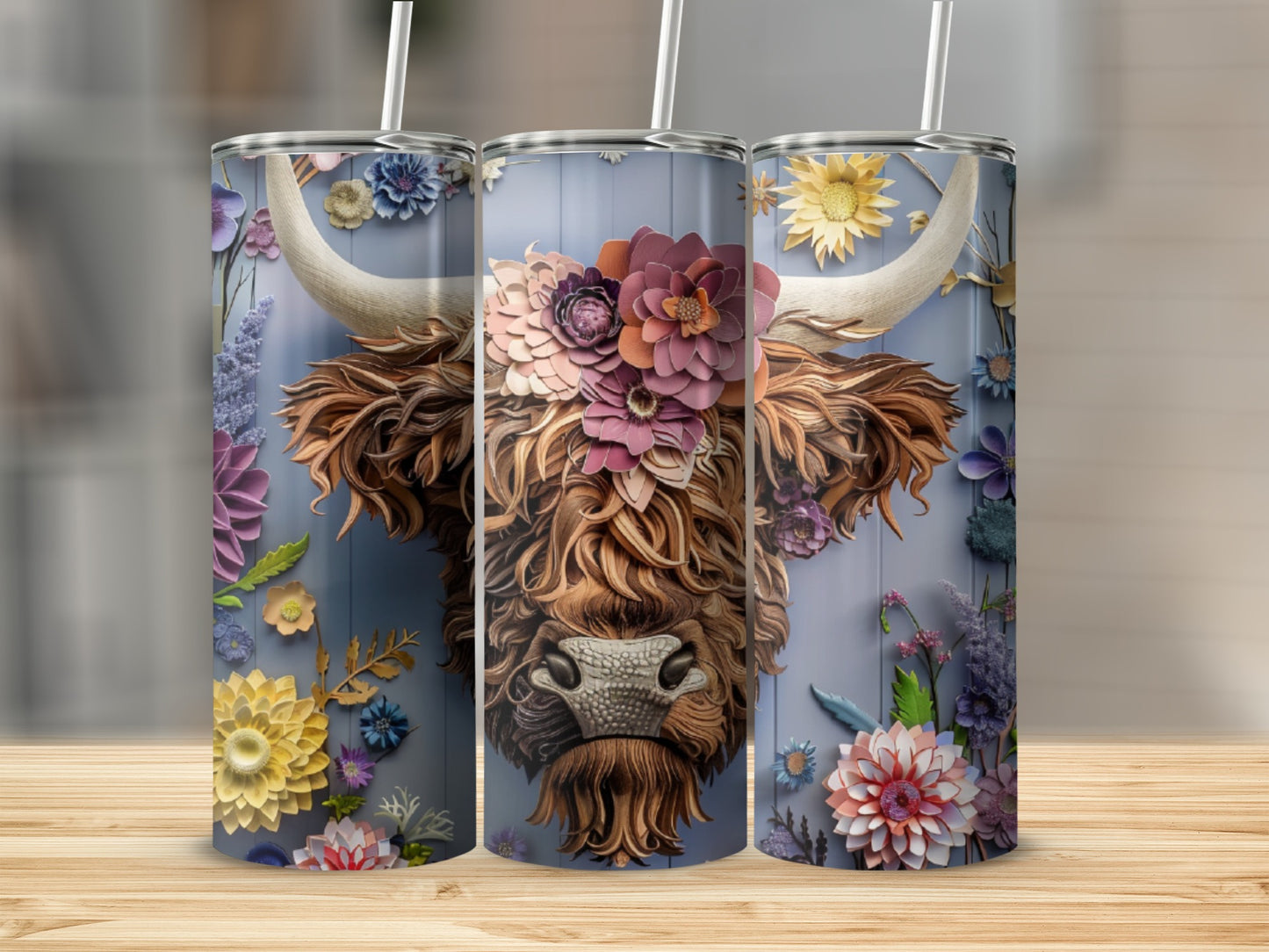 Highland cow adorned with colorful flowers on a blue wood-grain tumbler.
