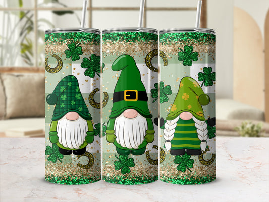 Three St. Patrick's Day gnomes with shamrocks and glitter on tumblers.