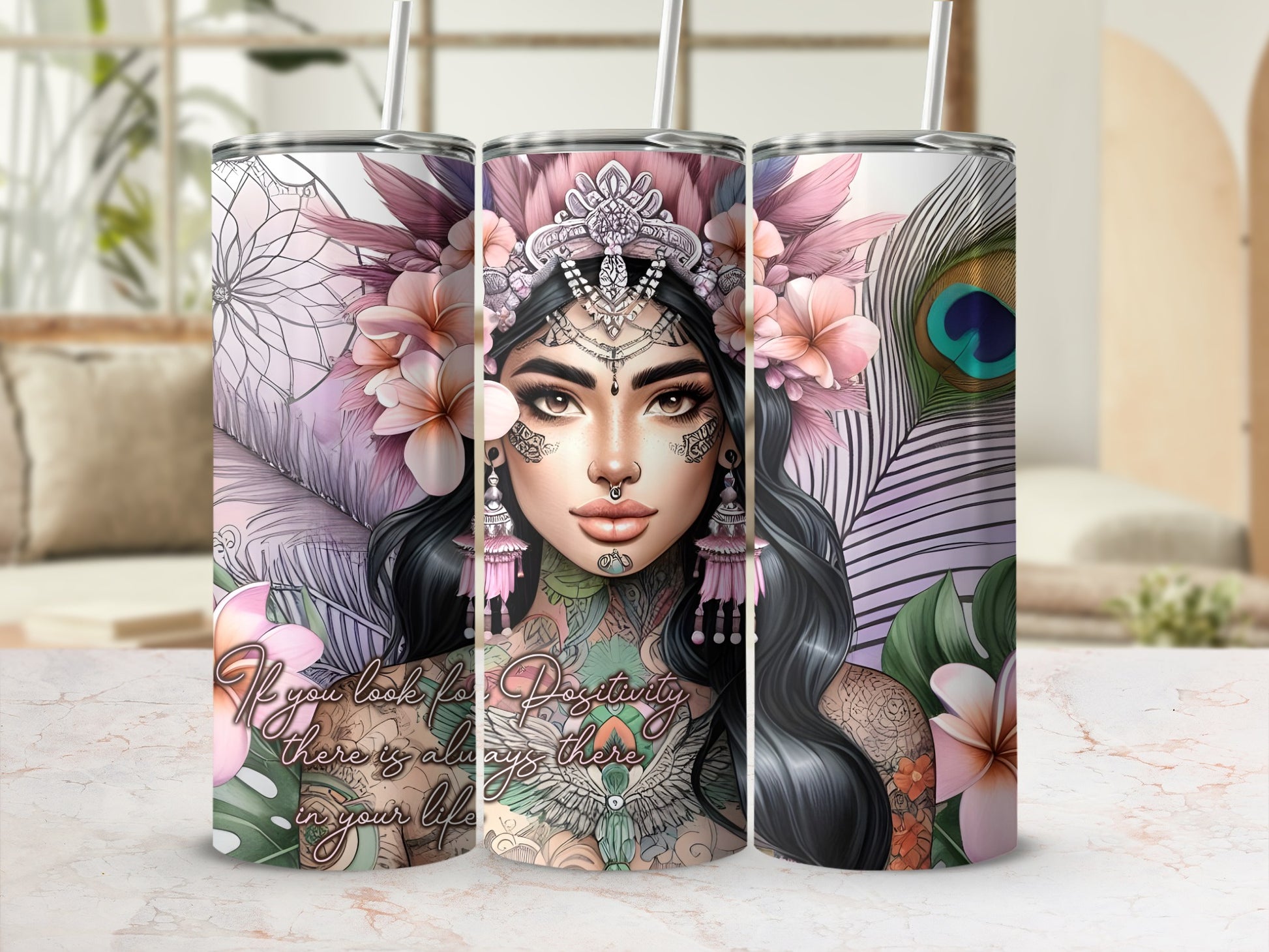 Tumbler with floral and peacock feather design and inspirational quote.