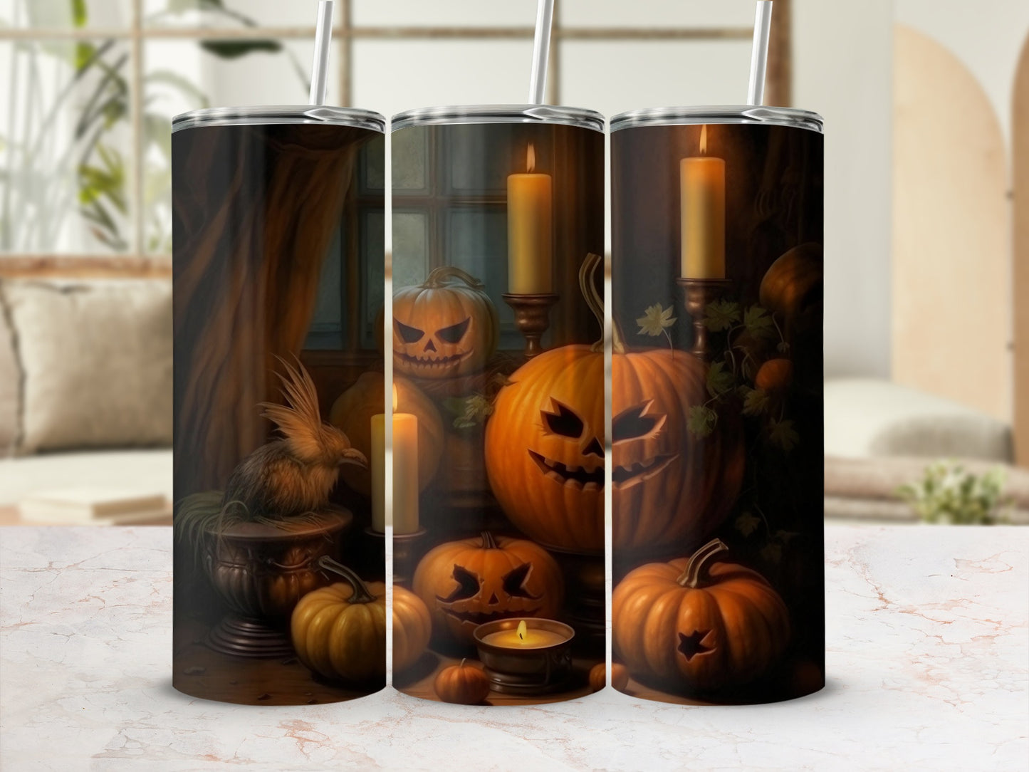 Halloween tumblers with jack-o'-lanterns, candles, and a bird on a pedestal.