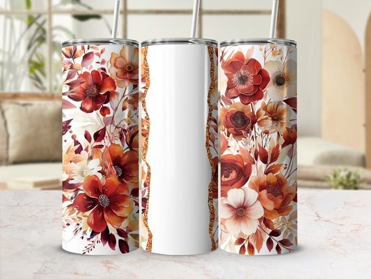 Three tumblers with a warm floral design and gold glitter accents.