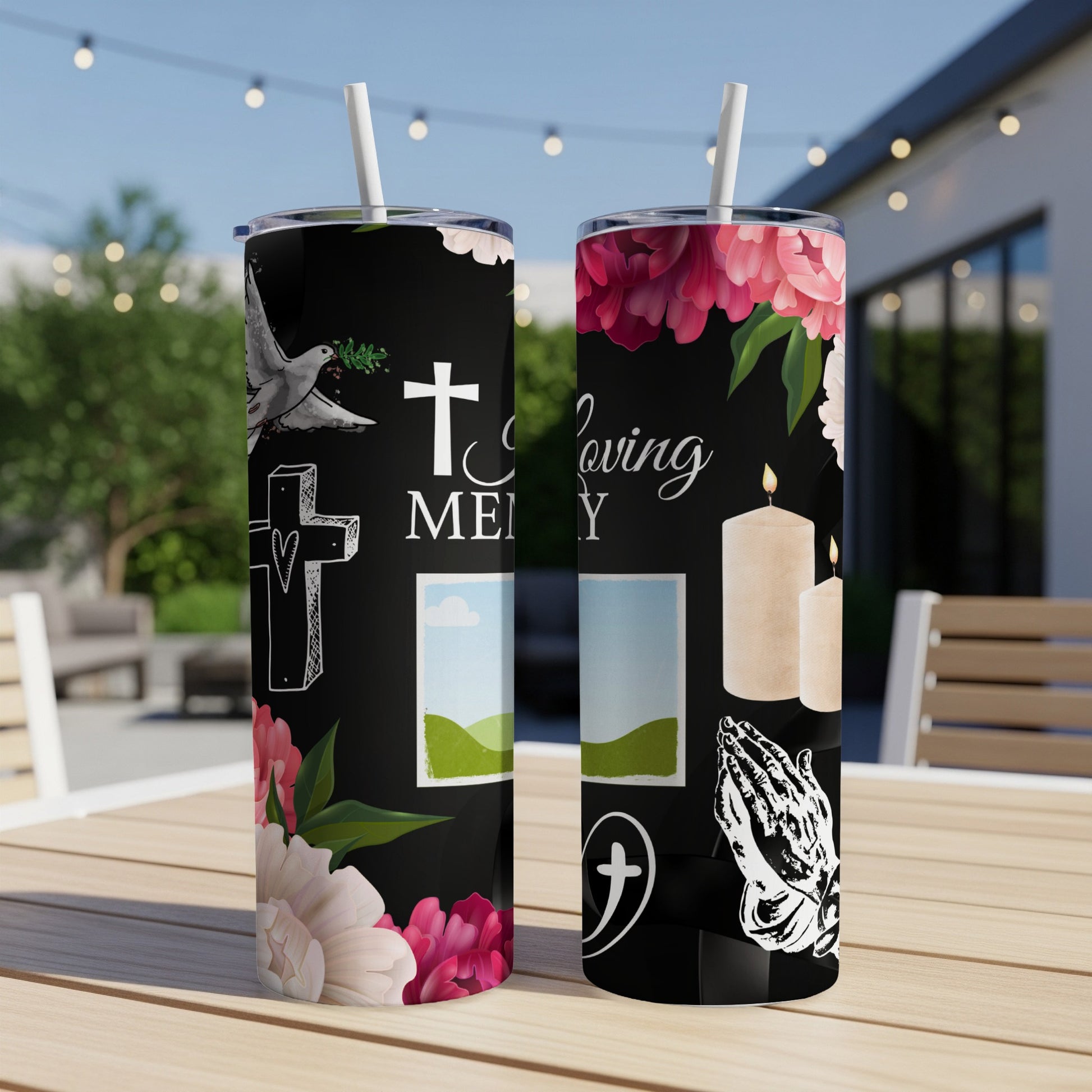 Two tumblers with a black background featuring a dove, cross, candles, praying hands, and flowers.