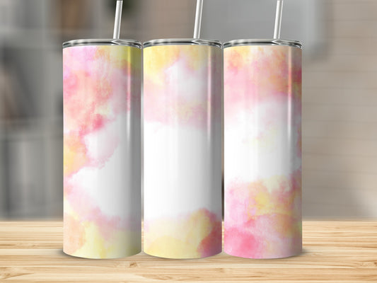 Three tumblers with a pink and yellow watercolor design on a wooden surface.