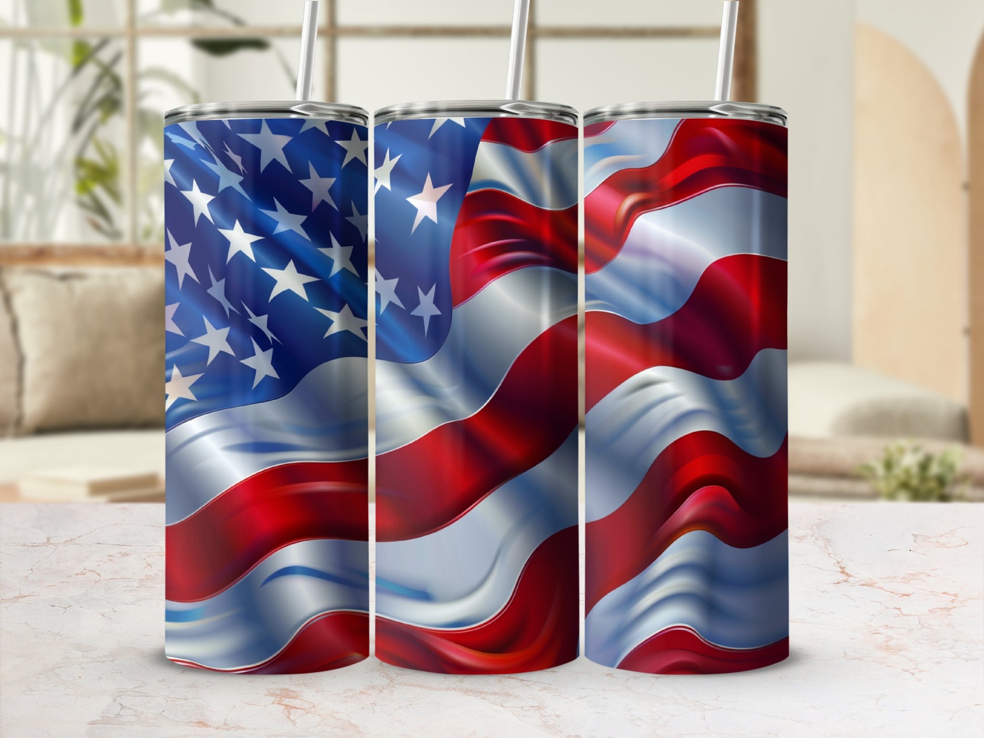 Waving American flag design on three identical tumblers.