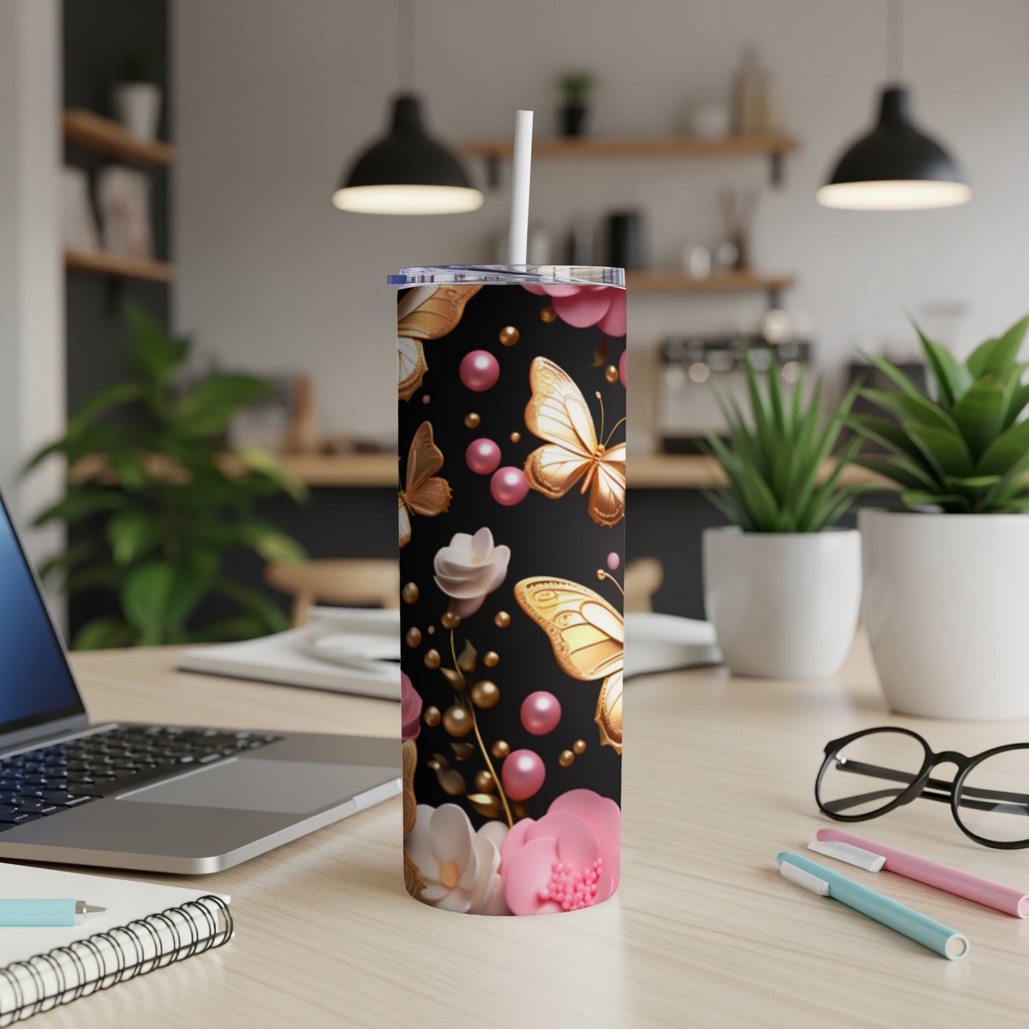 Black tumbler with gold butterflies, pink flowers, and pearl accents.
