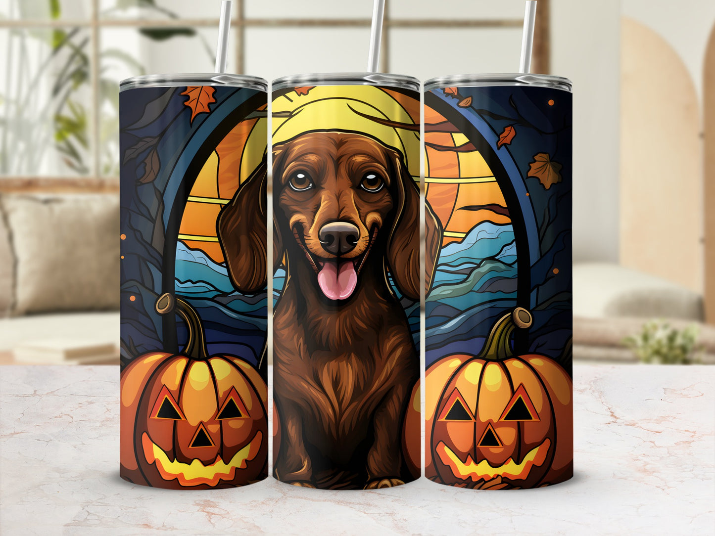 Dachshund wearing witch hat between two jack-o'-lanterns with autumn background.