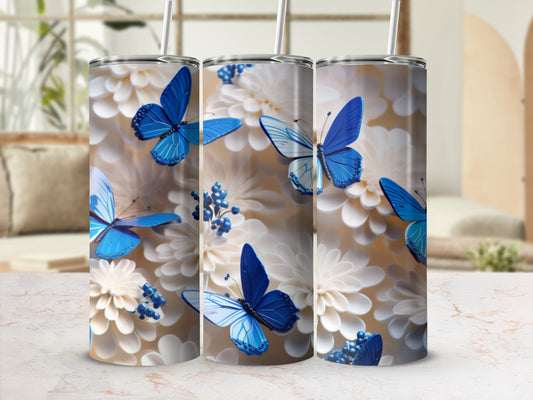 Three tumblers with blue butterflies and white flowers.