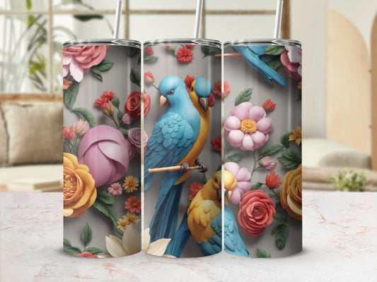 Two blue and yellow parrots among pink and yellow flowers.