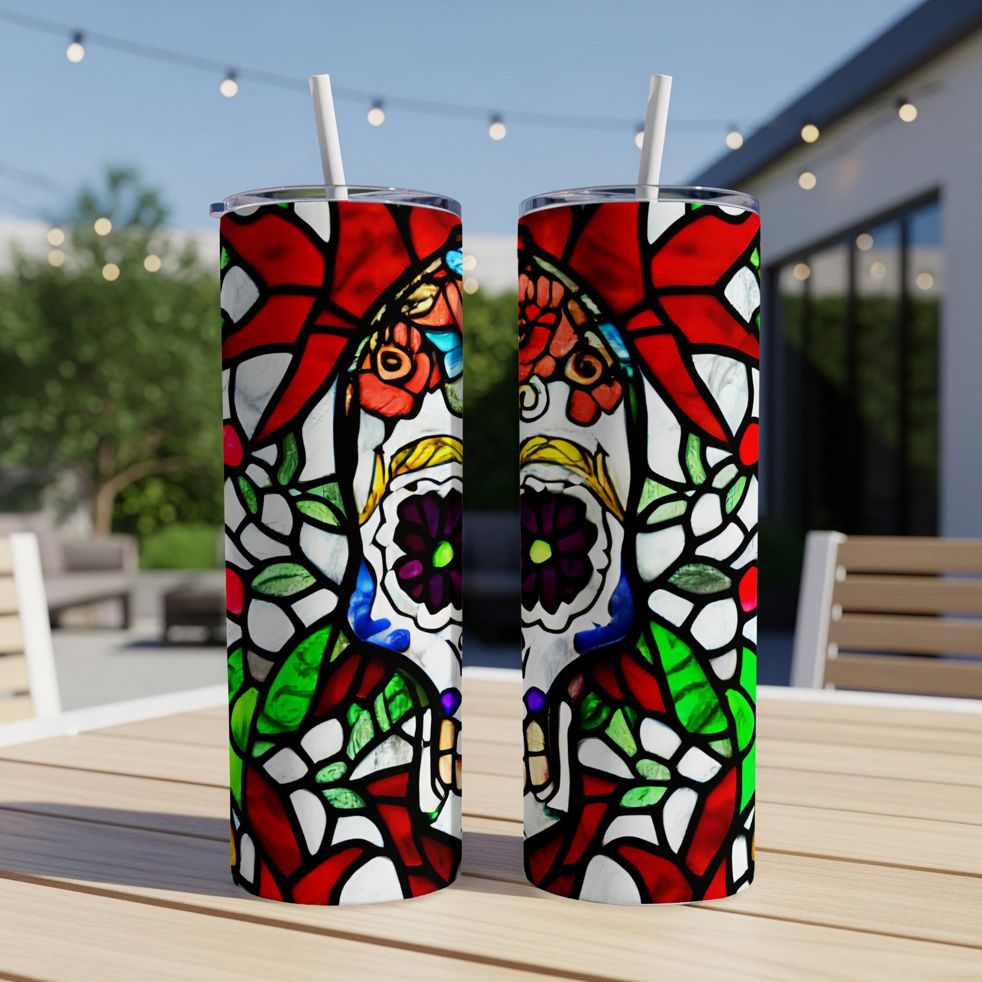 Two tall tumblers featuring stained-glass sugar skull designs.