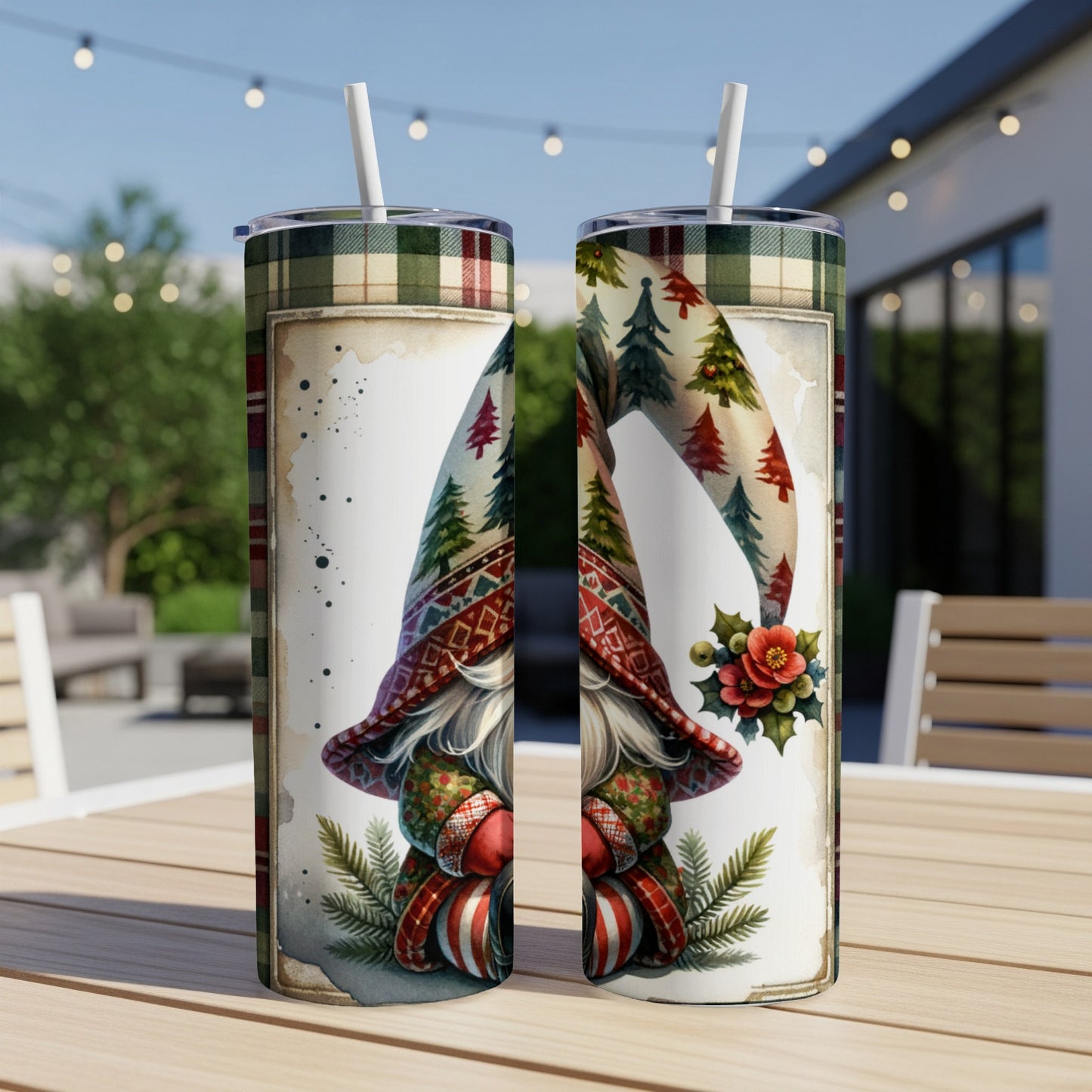 Two festive gnomes on tumblers with plaid hats and Christmas trees.
