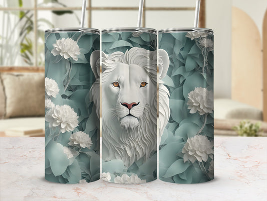 White lion face on a pale green floral background tumbler with straw.
