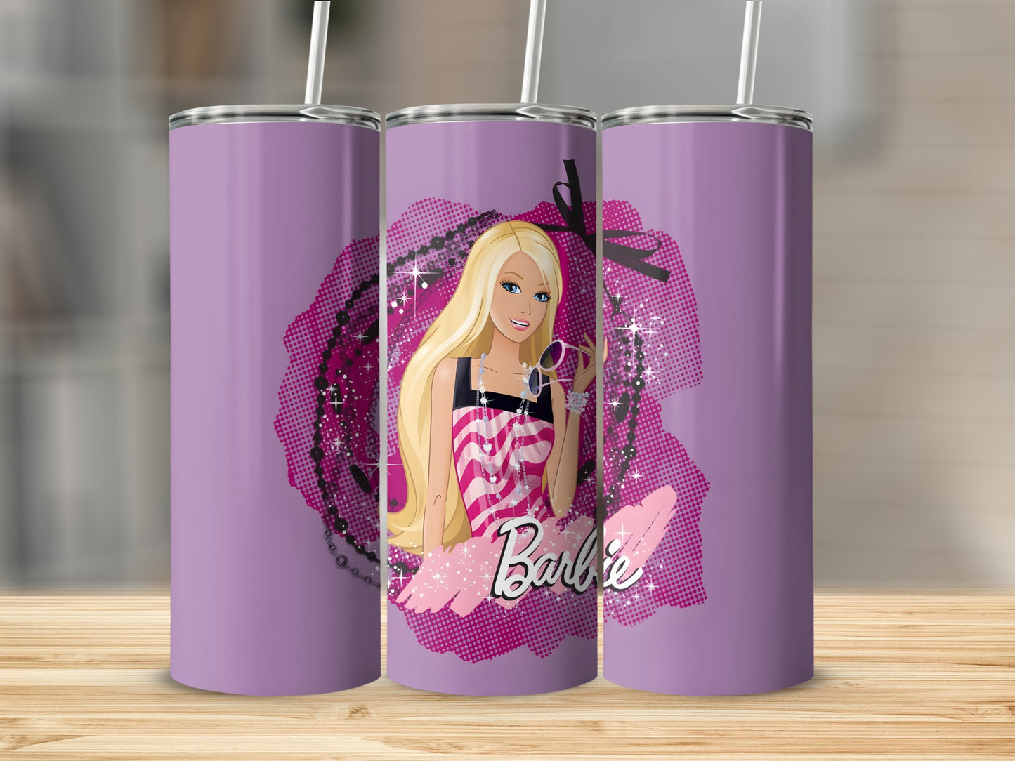 Barbie graphic on purple tumbler with pink accents and straw.