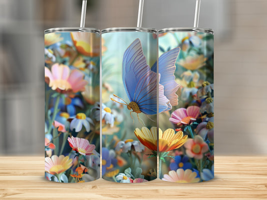 Three tumblers decorated with a colorful floral pattern and a blue butterfly.