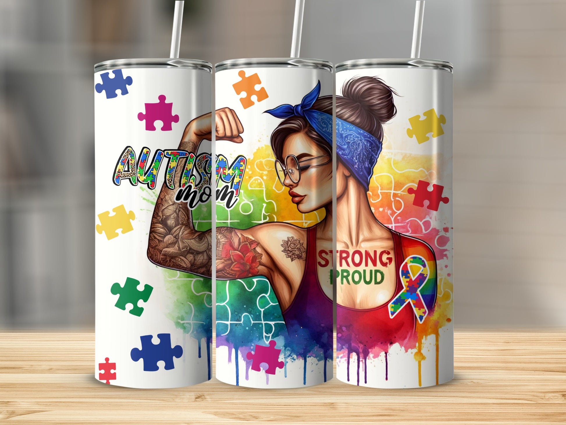 Tumbler with "Autism Mom" and rainbow puzzle ribbon, muscular arm.