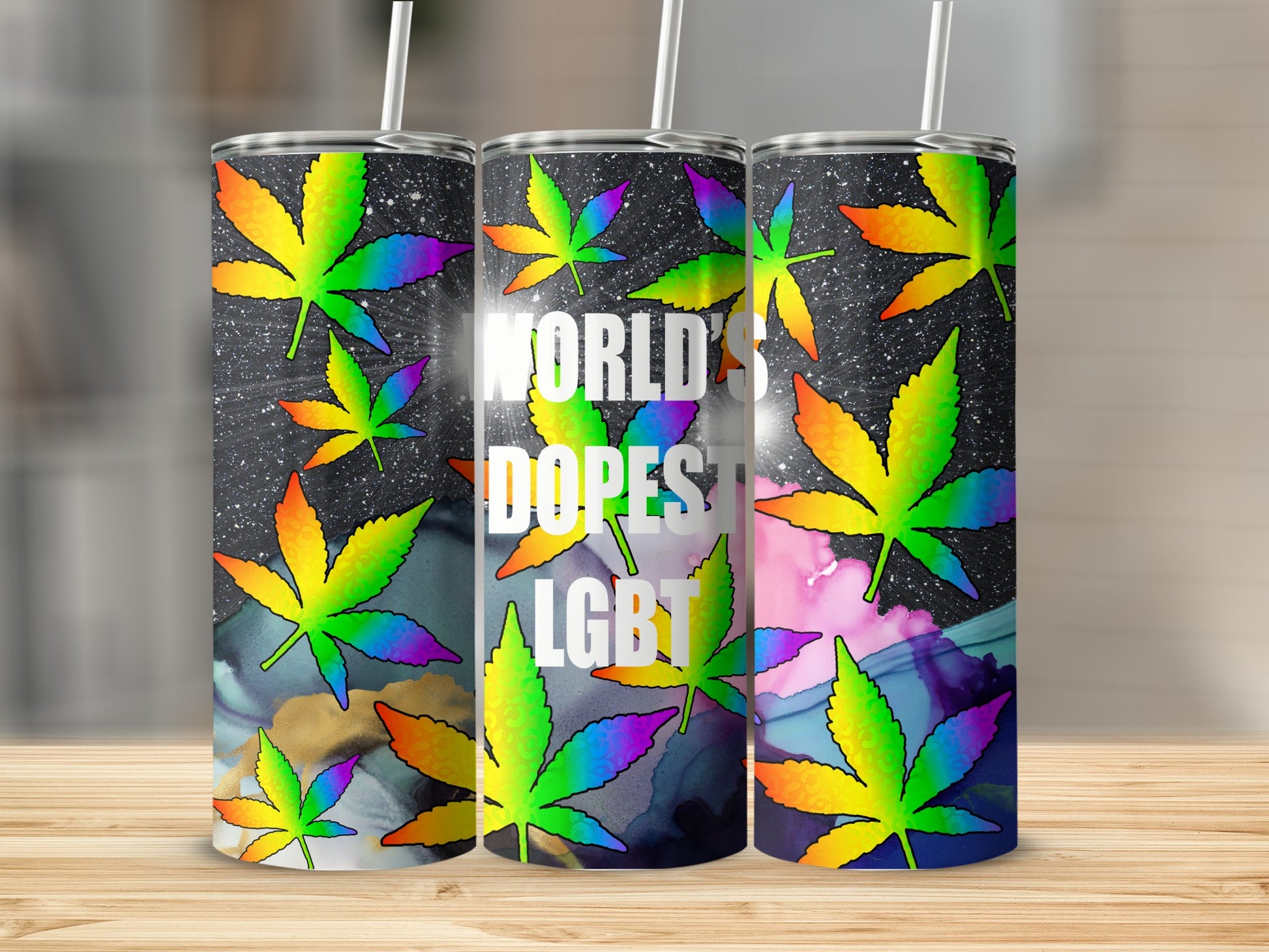 Tumbler with rainbow cannabis leaves and "World's Dopest LGBT" text.