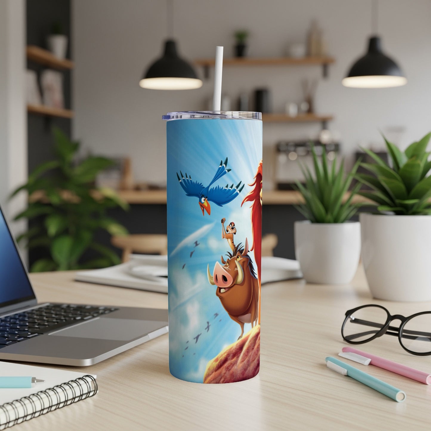 The Lion King characters Simba, Timon, and Zazu on a blue gradient tumbler.