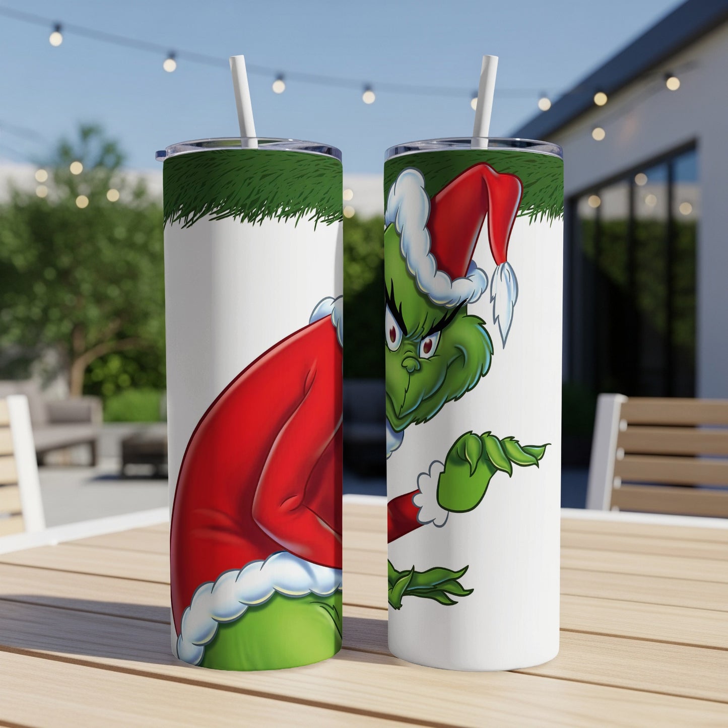 Grinch wearing Santa hat, holding out hand, on a white tumbler.