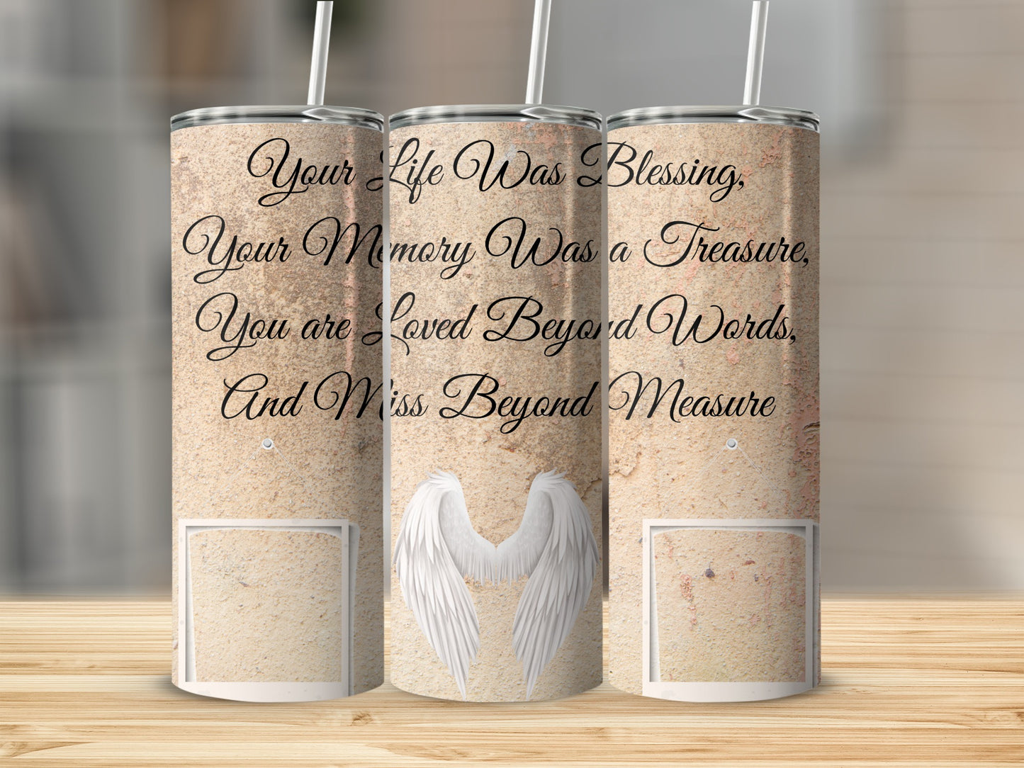 Tumbler with sand texture, angel wings, and memorial quote.