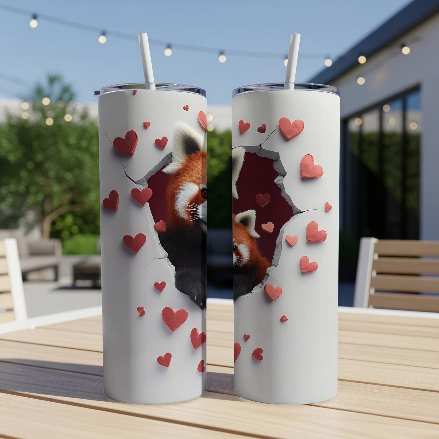 Two tumblers with red panda peering through cracked heart design.