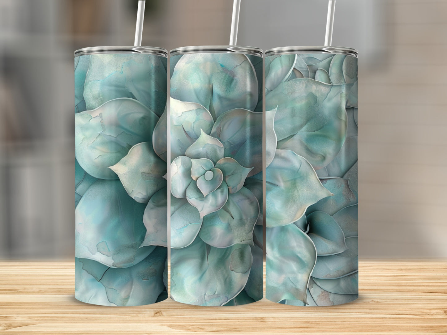Three tumblers featuring a close-up, abstract watercolor design of a succulent plant.