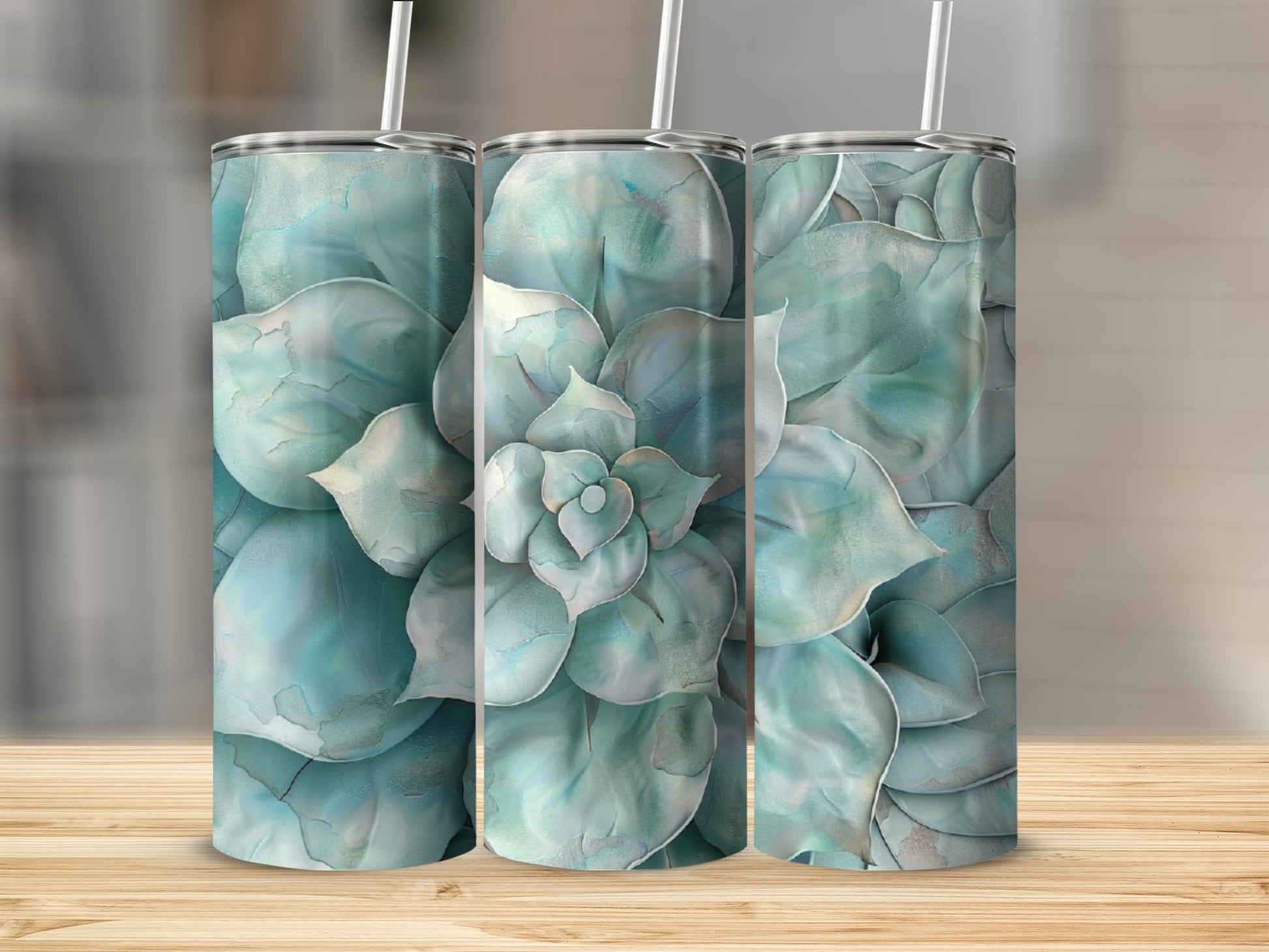 Three tumblers featuring a close-up, abstract watercolor design of a succulent plant.