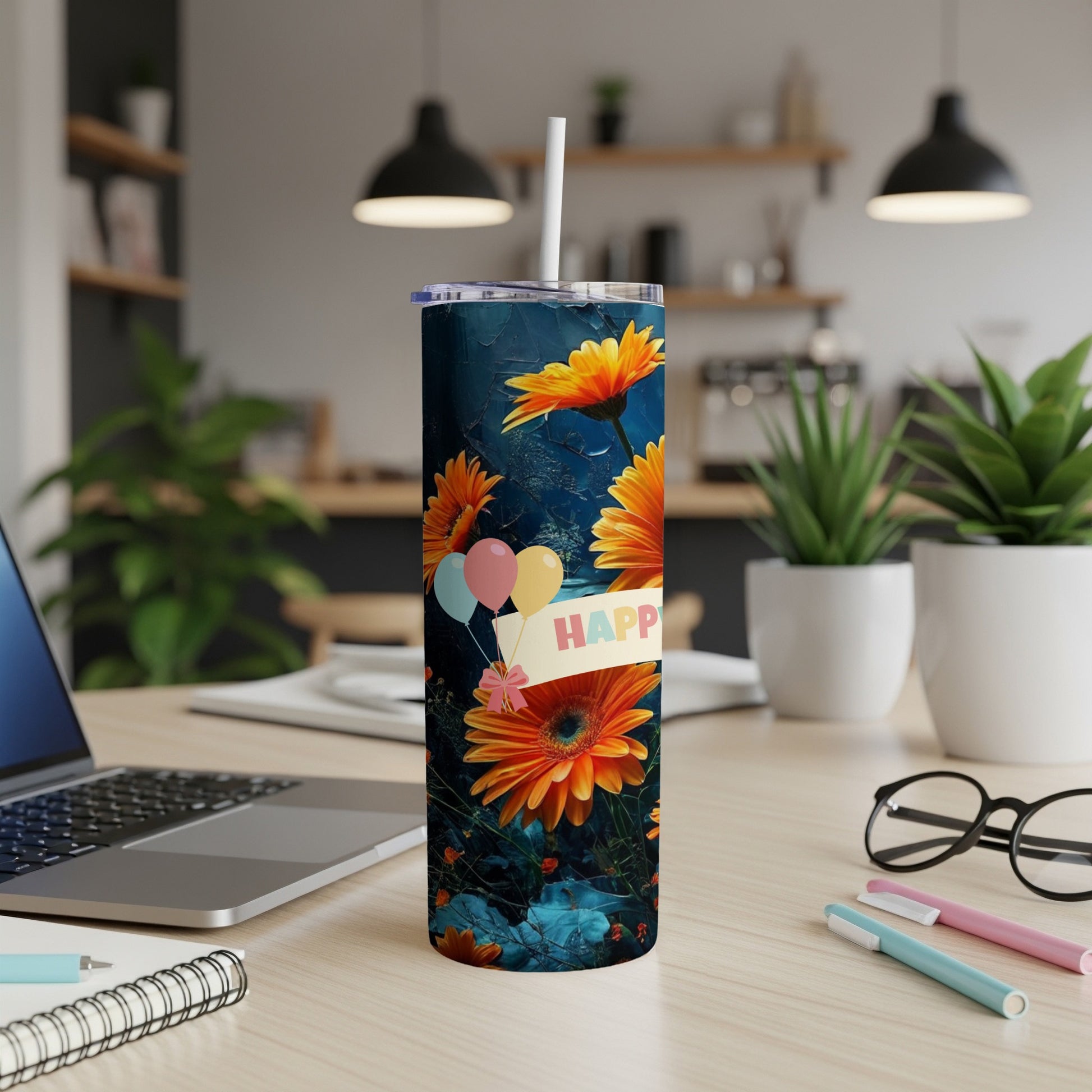 Tall tumbler with orange gerbera daisies and "Happy" banner.