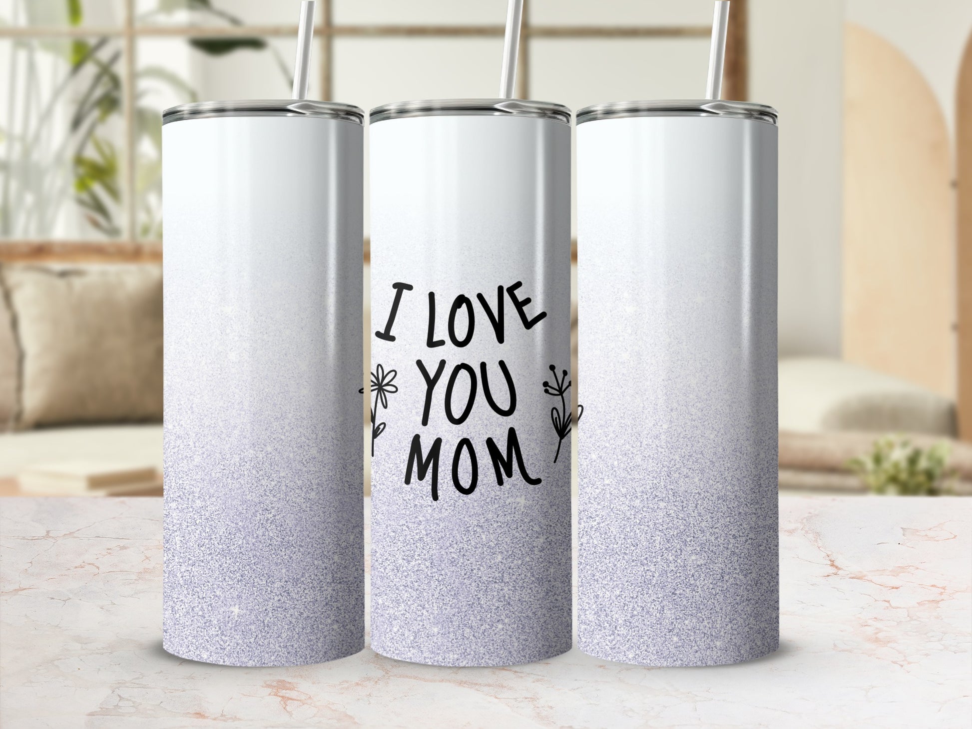 White glitter tumbler with "I LOVE YOU MOM" text and floral design.
