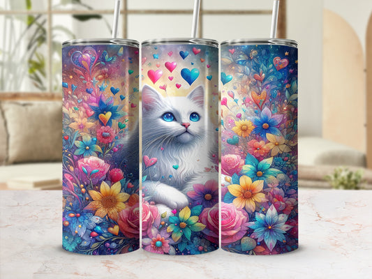 White cat surrounded by colorful flowers and hearts on a patterned tumbler.