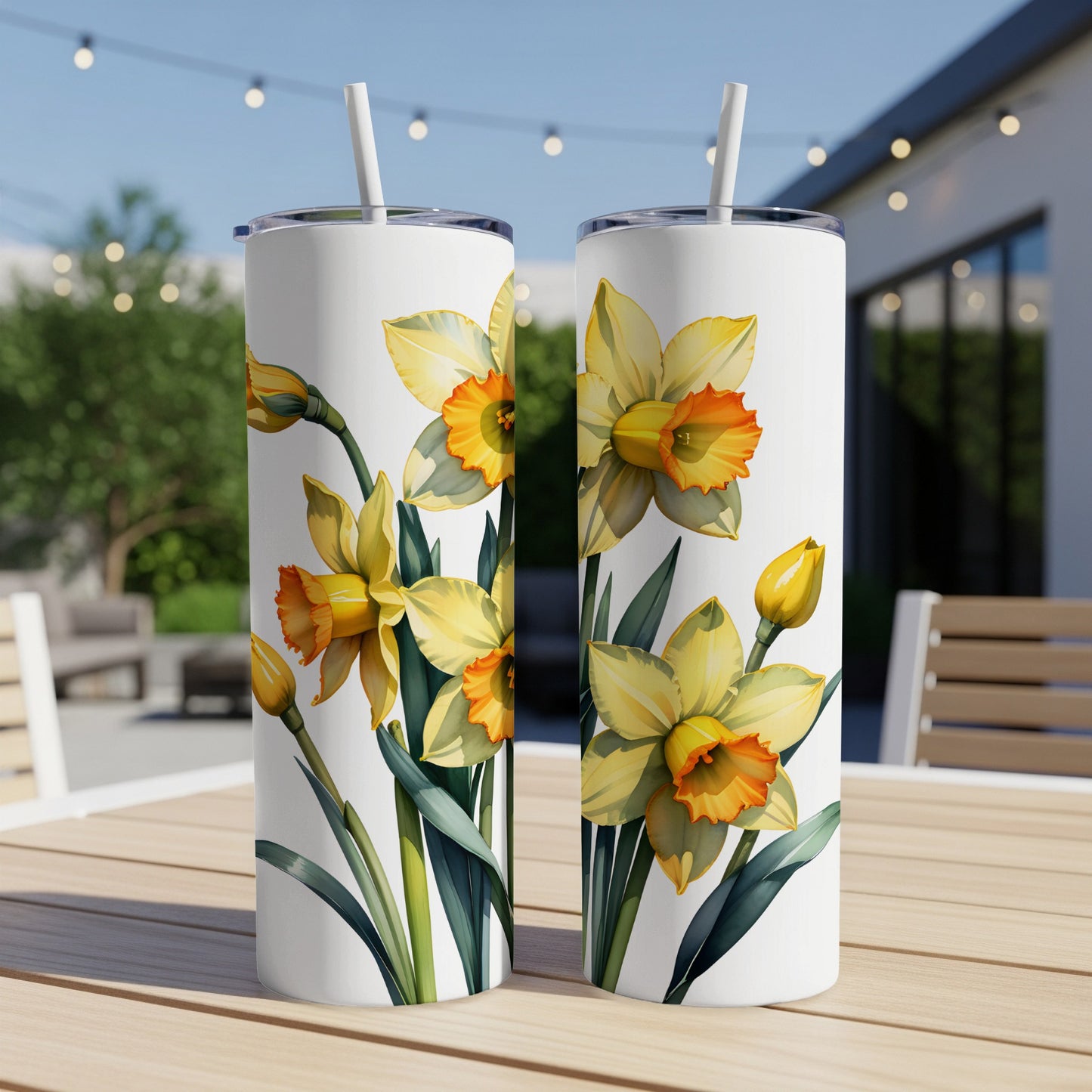 Two white tumblers with yellow daffodils and green leaves pattern.