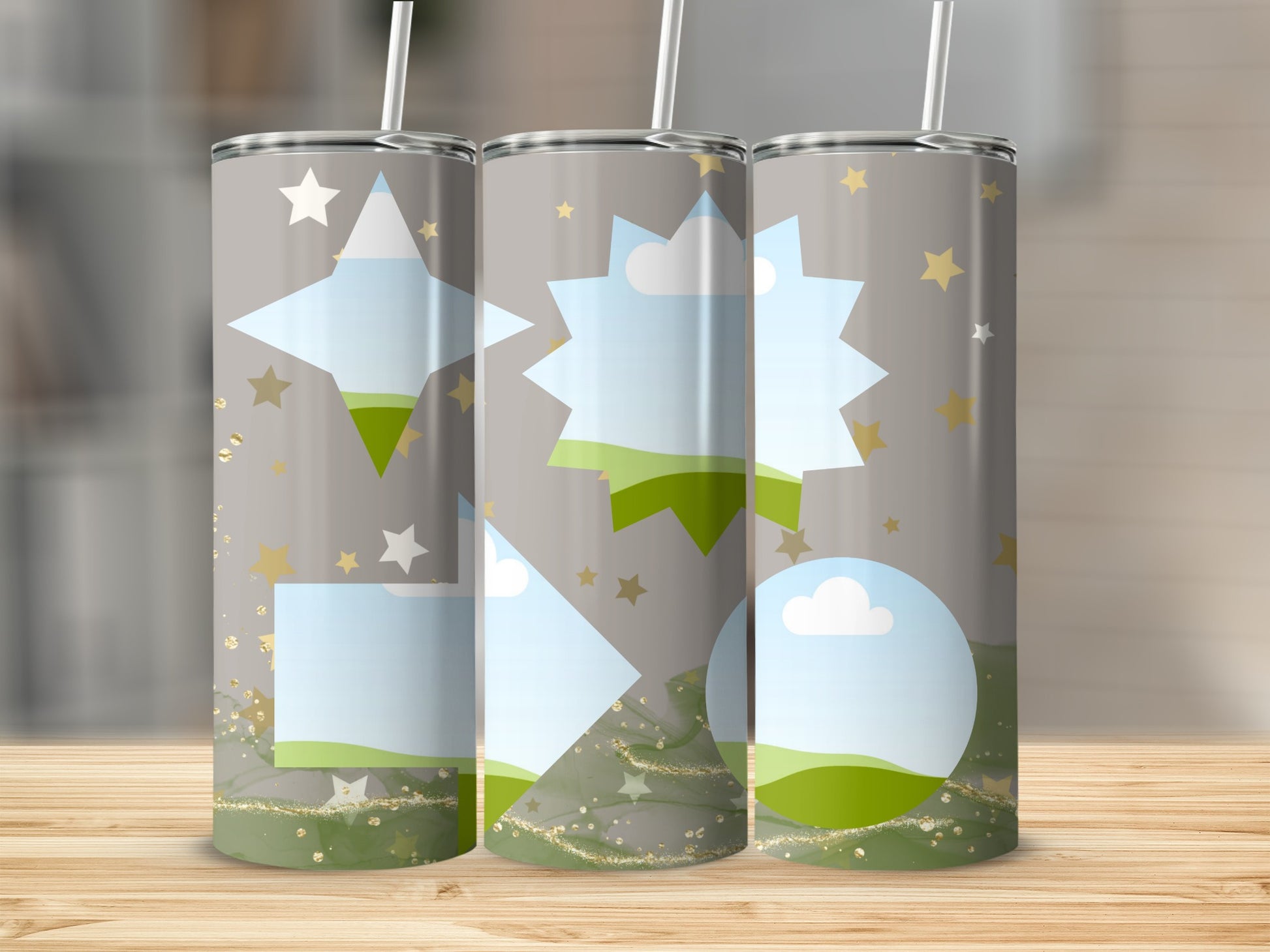 Three tumblers with stars, clouds, and photo placeholders on a wooden surface.