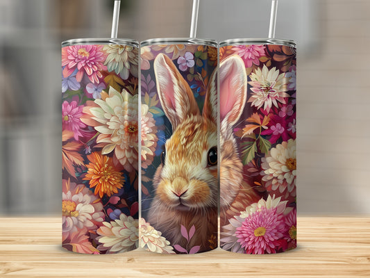 Bunny with floral pattern on three tumblers.