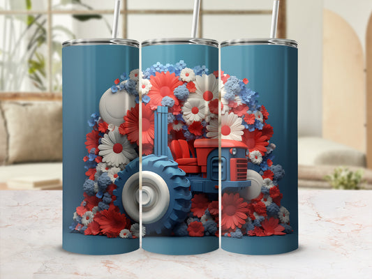 Red tractor surrounded by patriotic red, white, and blue flowers.